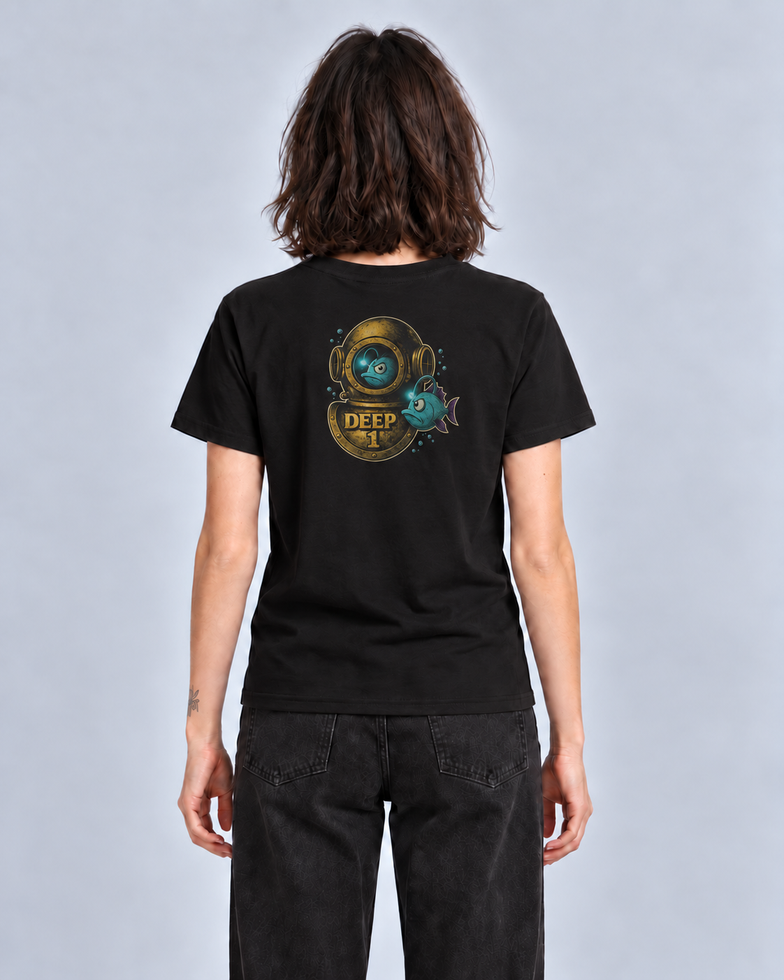 Deep 1 Black classic T-shirt on a female model, back view with the diving helmet and fish print.