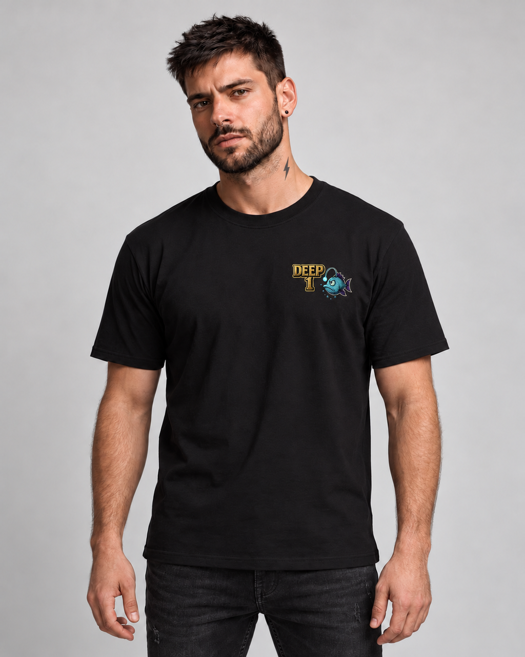 Deep 1 Black classic T-shirt on a male model, front view showing the small gold and teal left-chest print.