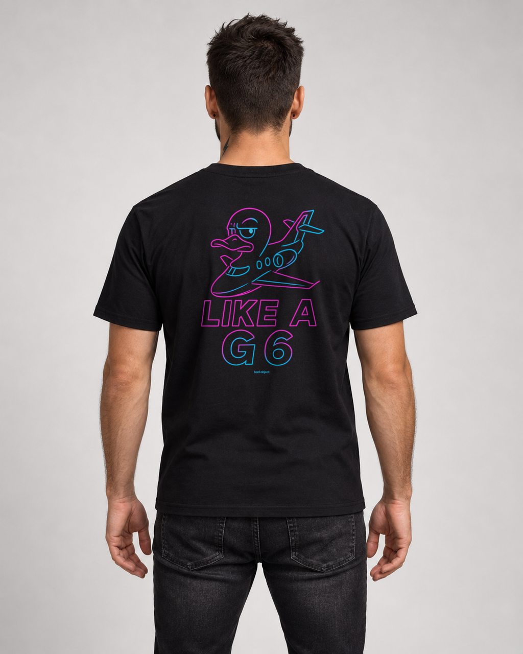 Like A G6 Neon black Classic T-shirt on a male model, back artwork with bad object. signature